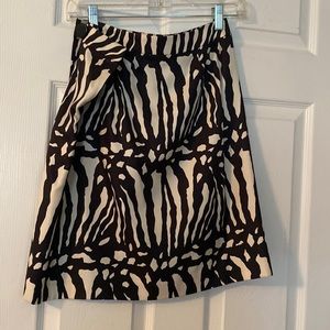 Woman’s cute wrap around zebra print skirt with zipper and side button skirt